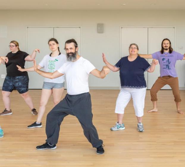 St. Edward's employees taking a Tai Chi Kung Fu class