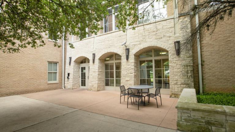 Outside seating area in Basil Moreau Hall